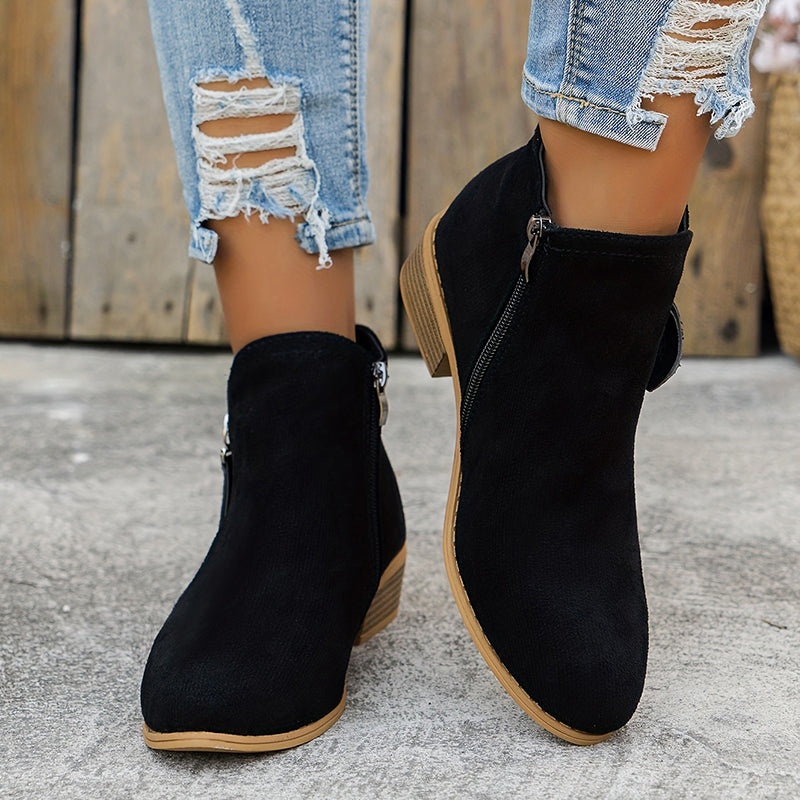 Women's block heel shoes in navy blue, featuring a zip closure and a modern, comfortable design. 7