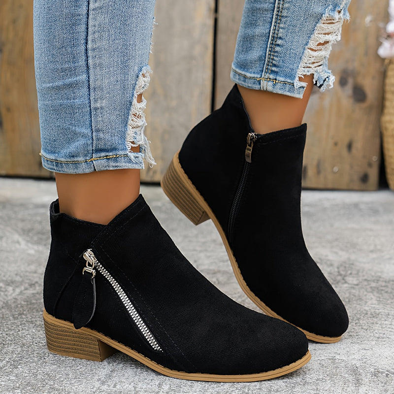 Women's block heel shoes in navy blue, featuring a zip closure and a modern, comfortable design. 9
