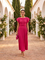 Flowy navy blue maxi dress with pleated detailing and a relaxed fit. Perfect for casual outings or summer gatherings. 0