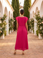 Flowy navy blue maxi dress with pleated detailing and a relaxed fit. Perfect for casual outings or summer gatherings. 1