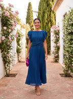 Flowy navy blue maxi dress with pleated detailing and a relaxed fit. Perfect for casual outings or summer gatherings. 4