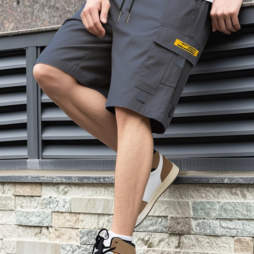 Men's lightweight cargo shorts in khaki, featuring a multi-pocket design for practicality and comfort. 8