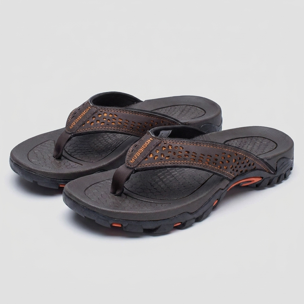 Men's flip flops in navy blue, featuring arch support and a sleek, water-resistant design. 1