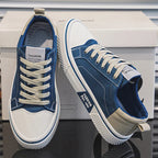 White minimalist sneakers with cushioned support, featuring a sleek design perfect for everyday wear. 0