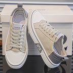 White minimalist sneakers with cushioned support, featuring a sleek design perfect for everyday wear. 5
