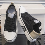 White minimalist sneakers with cushioned support, featuring a sleek design perfect for everyday wear. 7