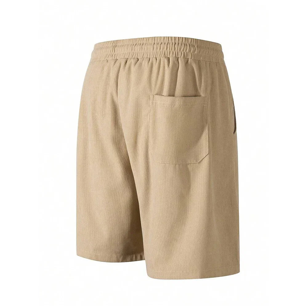 Men's relaxed-fit ribbed shorts in a soft grey color with an adjustable waistband. 2