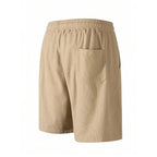 Men's relaxed-fit ribbed shorts in a soft grey color with an adjustable waistband. 2