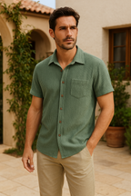 Light blue short sleeve casual shirt with a classic collar, made from breathable fabric. 1