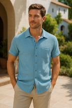 Light blue short sleeve casual shirt with a classic collar, made from breathable fabric. 2