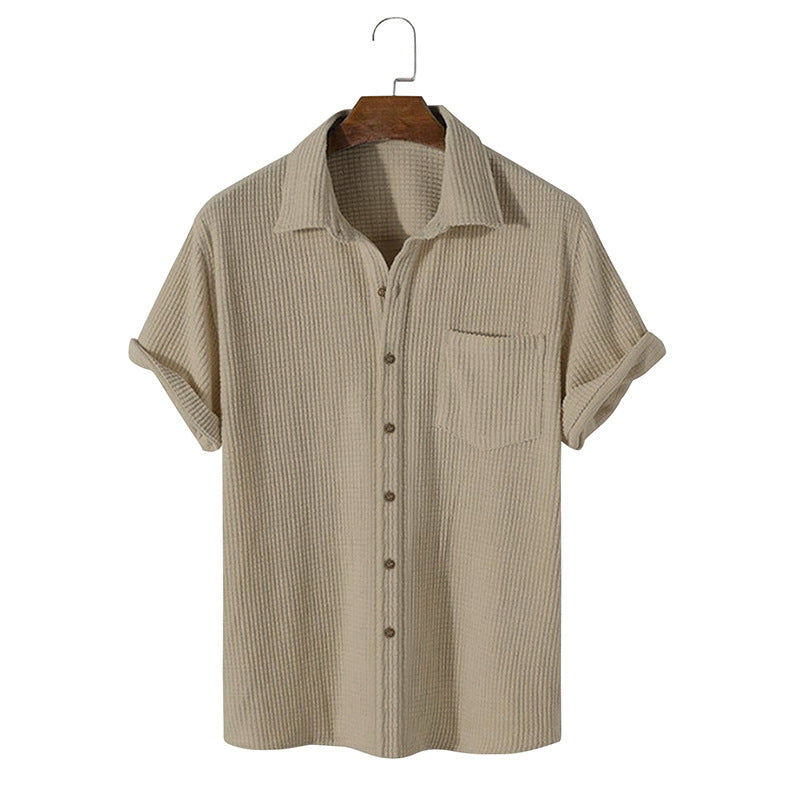 Light blue short sleeve casual shirt with a classic collar, made from breathable fabric. 3