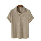 Light blue short sleeve casual shirt with a classic collar, made from breathable fabric. 3