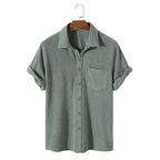 Light blue short sleeve casual shirt with a classic collar, made from breathable fabric. 4