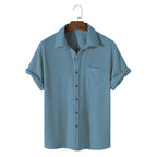 Light blue short sleeve casual shirt with a classic collar, made from breathable fabric. 5