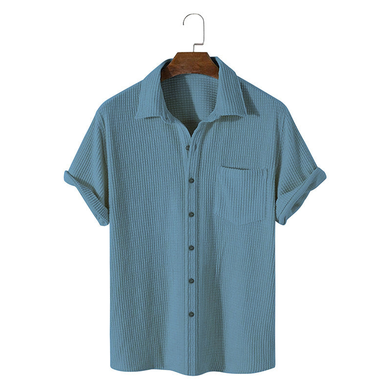 Light blue short sleeve casual shirt with a classic collar, made from breathable fabric. 5