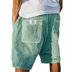 Men's tailored summer shorts in light beige with a textured finish, offering a smart-casual style. 3