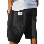Men's tailored summer shorts in light beige with a textured finish, offering a smart-casual style. 4