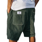 Men's tailored summer shorts in light beige with a textured finish, offering a smart-casual style. 5