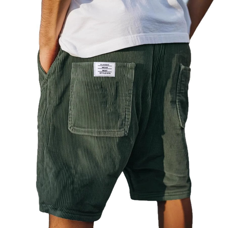 Men's tailored summer shorts in light beige with a textured finish, offering a smart-casual style. 5