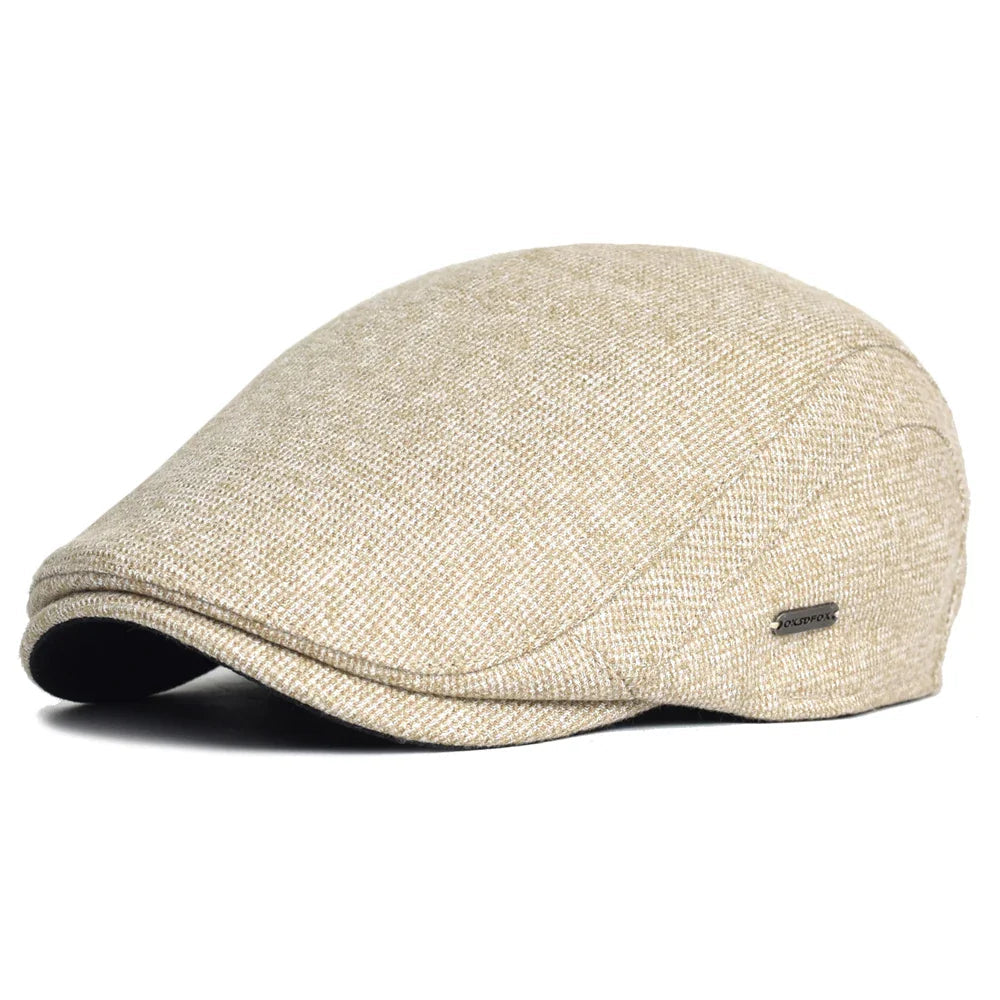 Soft blend wool beret in a muted gray color with a classic rounded silhouette. 0