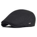 Soft blend wool beret in a muted gray color with a classic rounded silhouette. 4