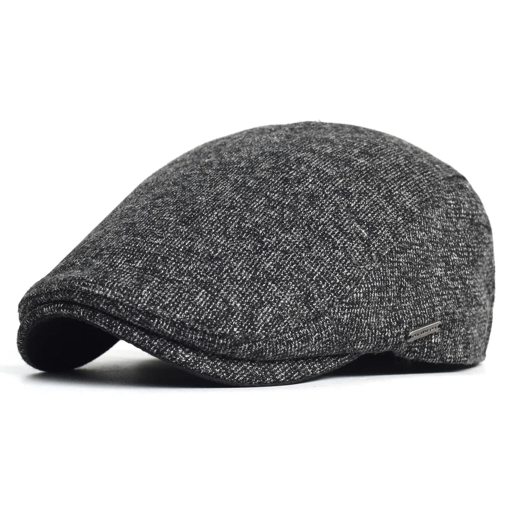 Soft blend wool beret in a muted gray color with a classic rounded silhouette. 5