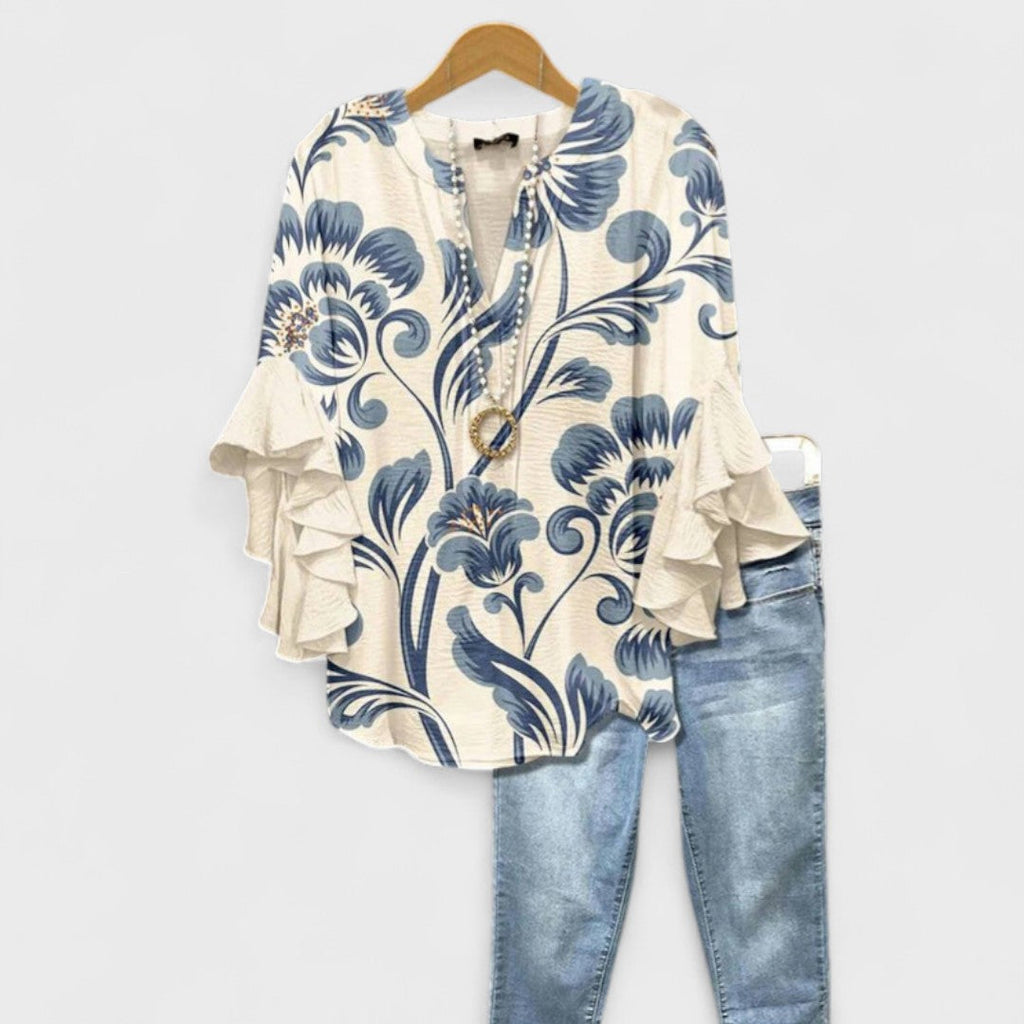 Lila floral blouse, light purple with ruffled sleeves, in a relaxed fit for women. 0