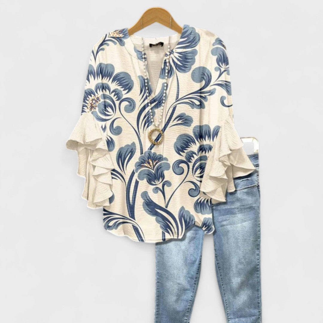 Lila floral blouse, light purple with ruffled sleeves, in a relaxed fit for women. 0
