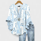 Lila floral blouse, light purple with ruffled sleeves, in a relaxed fit for women. 1