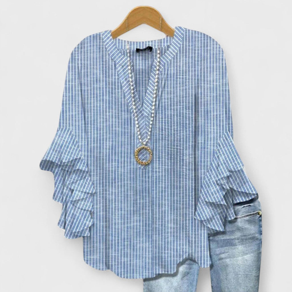Lila floral blouse, light purple with ruffled sleeves, in a relaxed fit for women. 2