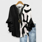 Lila floral blouse, light purple with ruffled sleeves, in a relaxed fit for women. 4