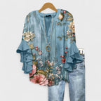 Lila floral blouse, light purple with ruffled sleeves, in a relaxed fit for women. 6