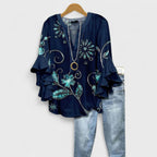 Lila floral blouse, light purple with ruffled sleeves, in a relaxed fit for women. 9