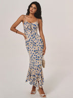 Lila floral maxi dress in soft purple with an irregular hem, featuring a flowing, bohemian style. 2