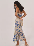 Lila floral maxi dress in soft purple with an irregular hem, featuring a flowing, bohemian style. 3