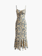 Lila floral maxi dress in soft purple with an irregular hem, featuring a flowing, bohemian style. 5