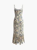 Lila floral maxi dress in soft purple with an irregular hem, featuring a flowing, bohemian style. 6