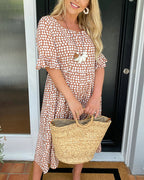Lila A-line dress in soft lavender with white polka dots and ruffle sleeves. 7
