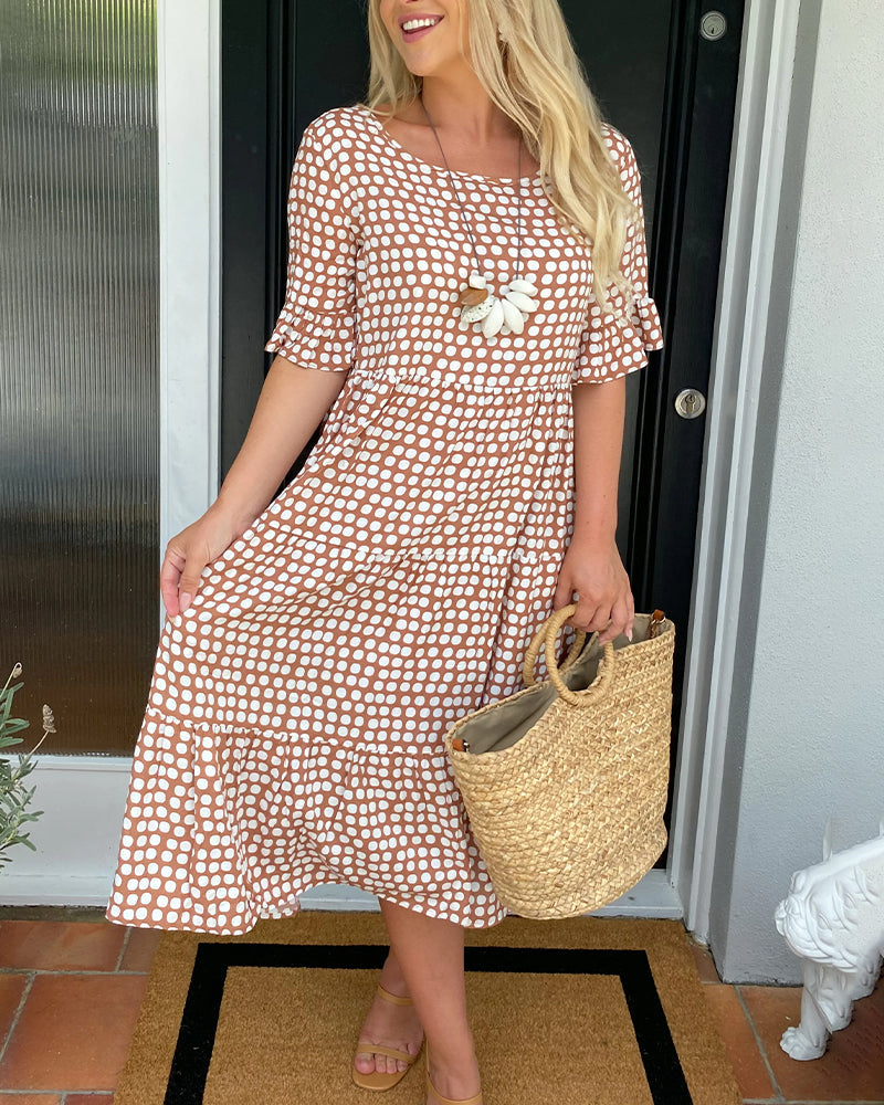 Lila A-line dress in soft lavender with white polka dots and ruffle sleeves. 8