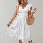 Lightweight summer dress in soft pink with flutter sleeves, perfect for casual outings. 0