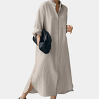 Light blue linen shirt dress with a relaxed fit and button-down front, perfect for casual summer outings. 4