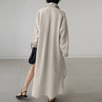 Light blue linen shirt dress with a relaxed fit and button-down front, perfect for casual summer outings. 5
