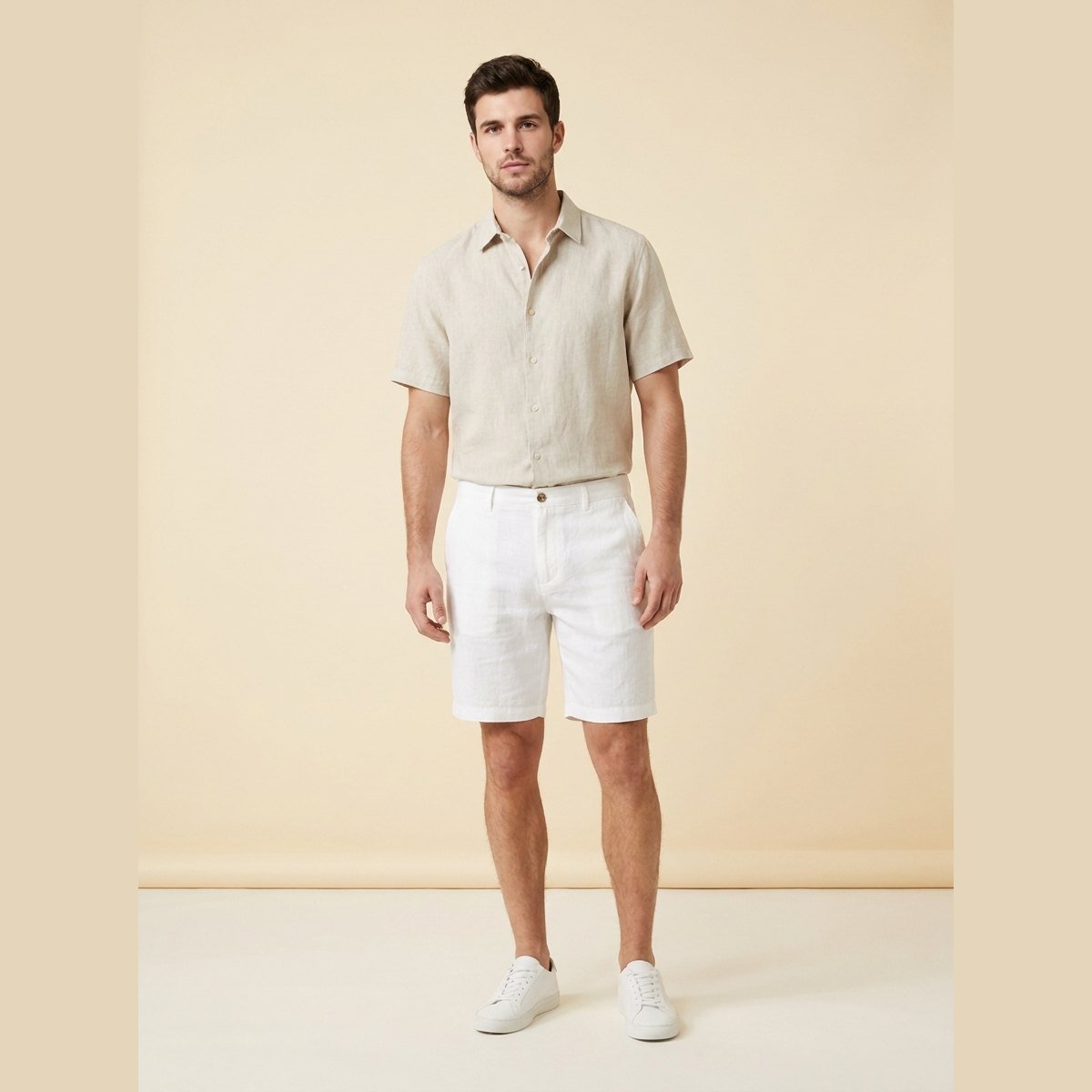 Light beige linen shorts with a relaxed fit and drawstring closure, perfect for casual summer wear. 0