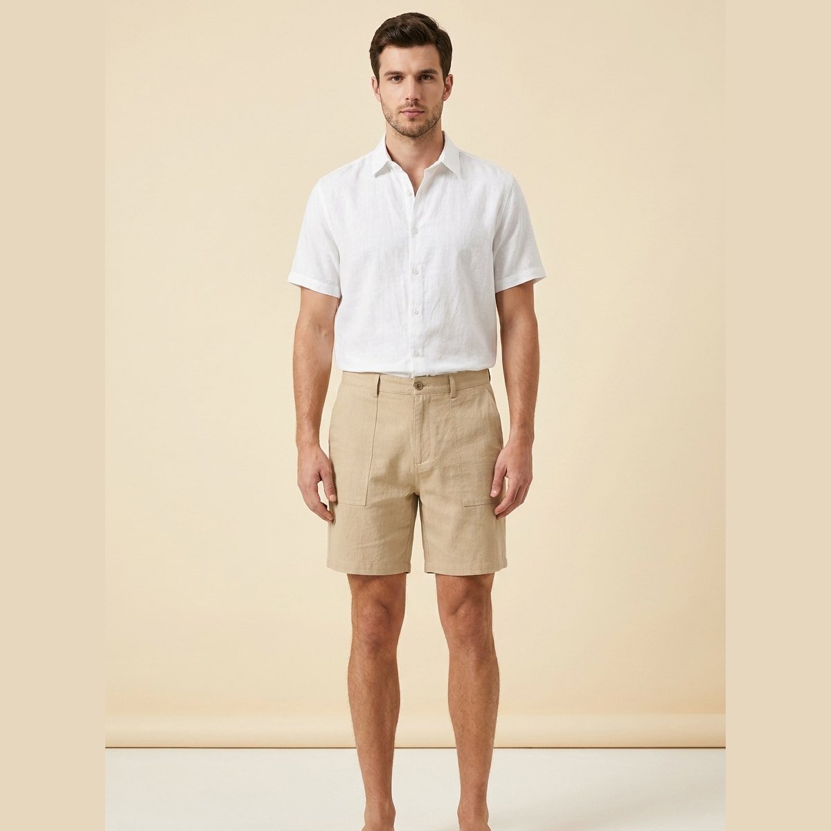 Light beige linen shorts with a relaxed fit and drawstring closure, perfect for casual summer wear. 3