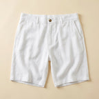 Light beige linen shorts with a relaxed fit and drawstring closure, perfect for casual summer wear. 5
