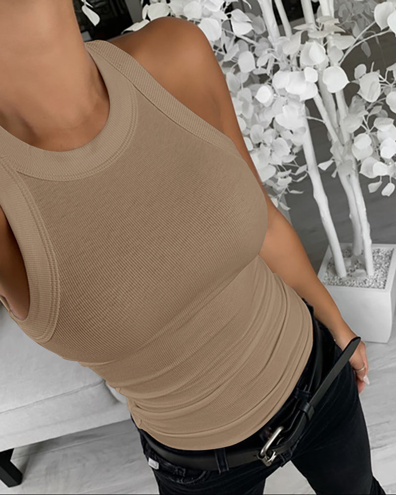 Liora ribbed tank top in soft beige, O-neck design, sleeveless, slim fit, perfect for casual wear. 9