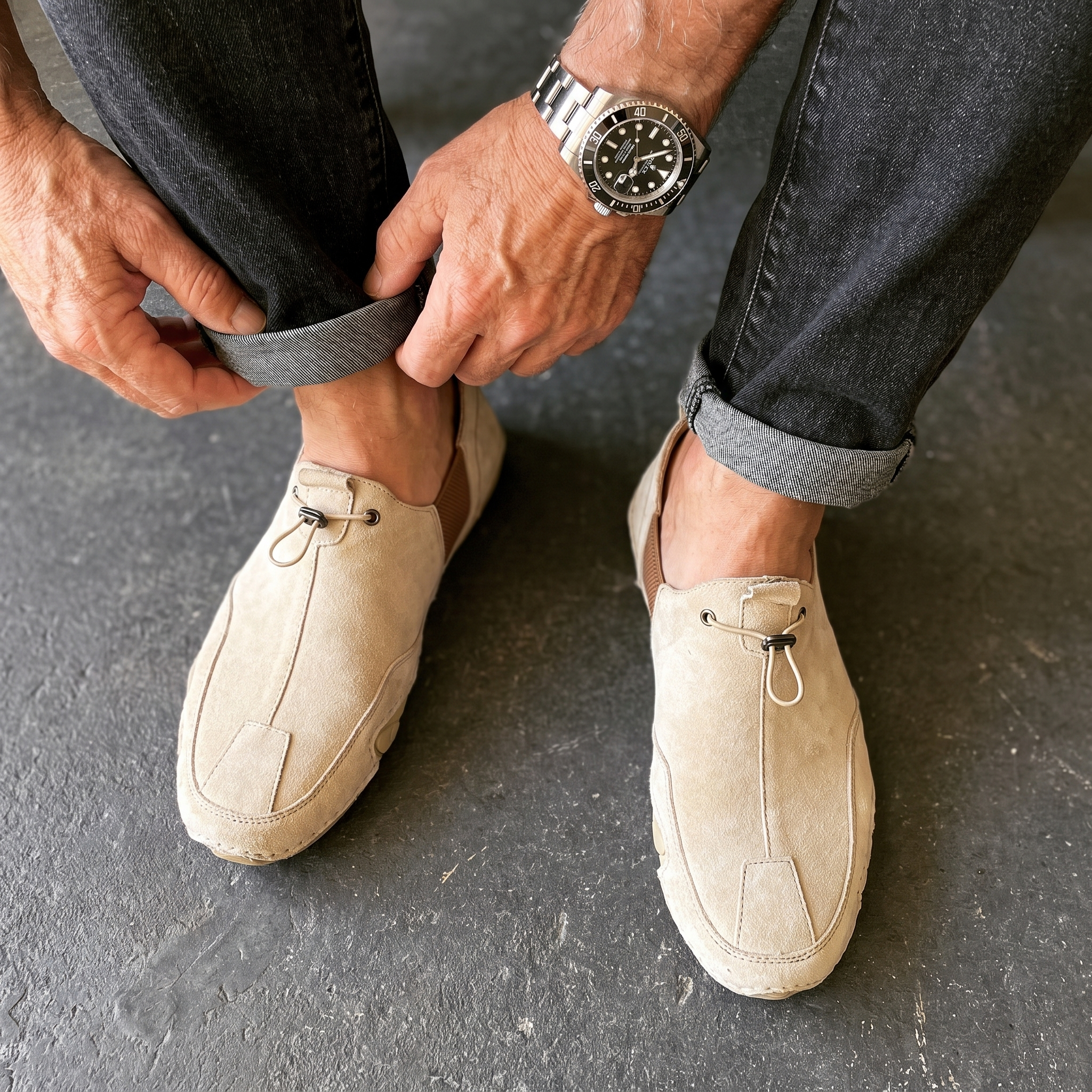 Brown leather slip-ons with elastic lacing and a non-slip sole, featuring a sleek and casual design. 1