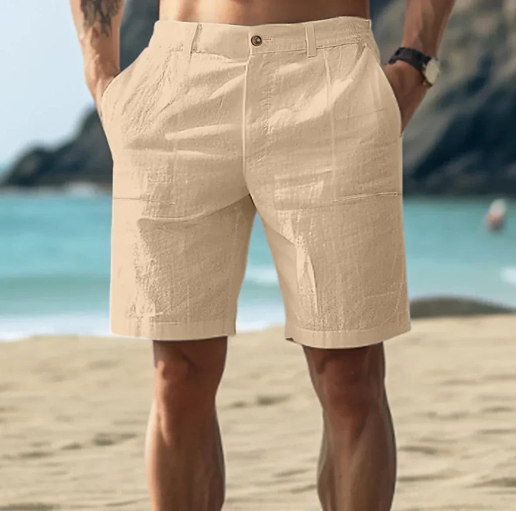 Light beige linen shorts in a relaxed, casual style perfect for warm weather outings. 1