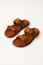 Elegant tan leather sandals for women, featuring a minimalist design with a comfortable flat sole. 2