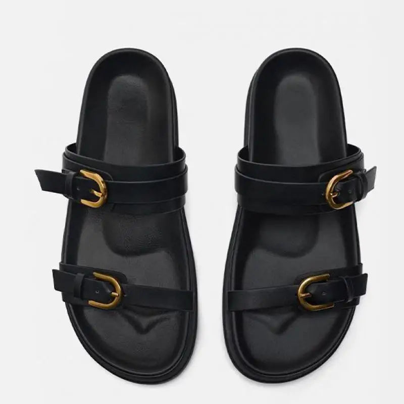 Elegant tan leather sandals for women, featuring a minimalist design with a comfortable flat sole. 6